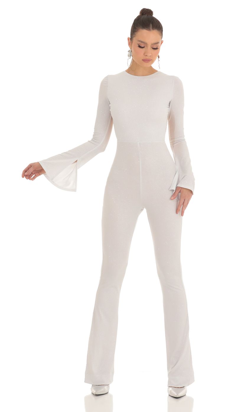 Picture Silver Shimmer Open Back Jumpsuit in White. Source: https://media-img.lucyinthesky.com/data/Feb23/850xAUTO/62862352-687b-42b4-806d-3a6a786147e9.jpg