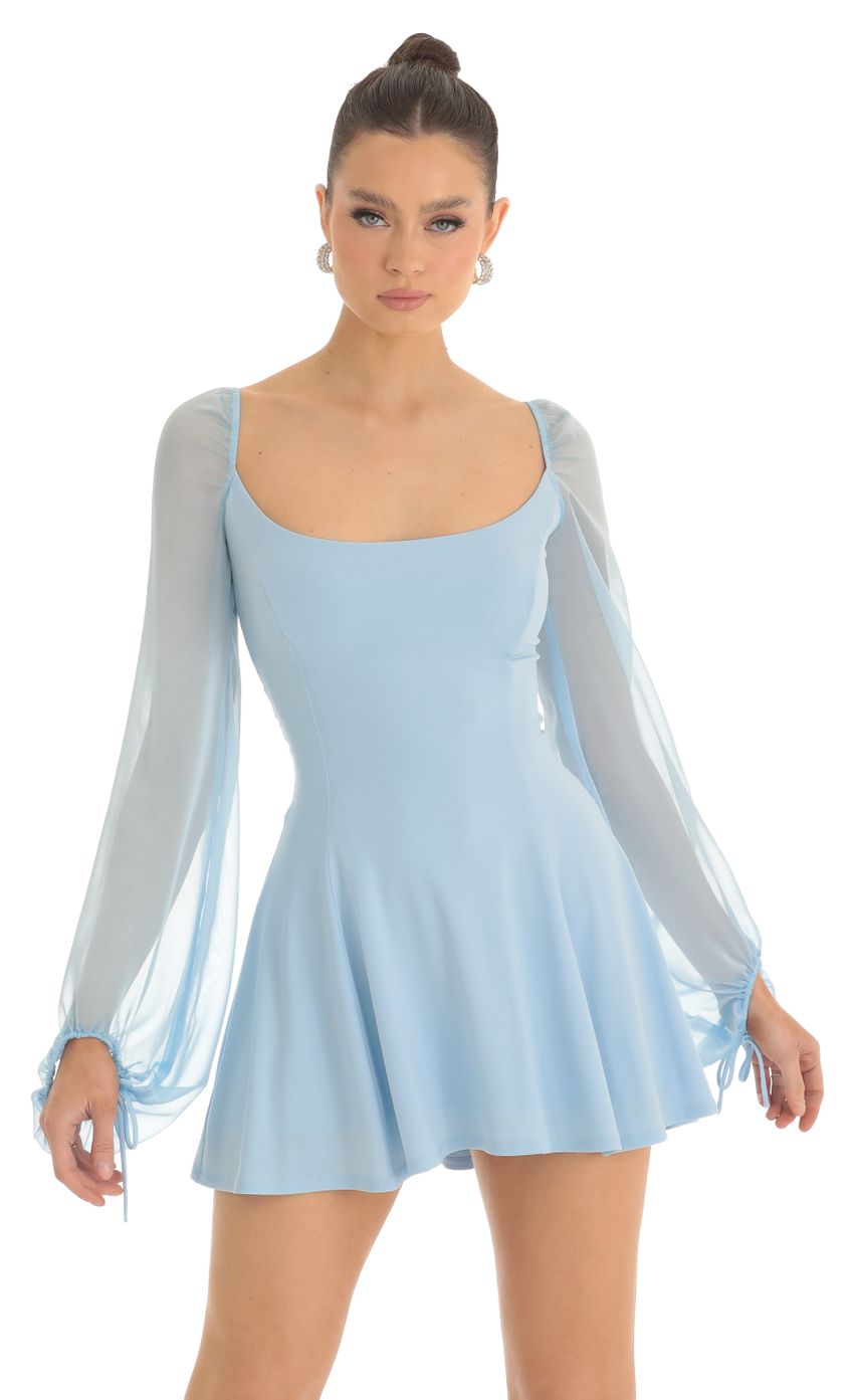 Picture Sheer Sleeve Dress in Light Blue. Source: https://media-img.lucyinthesky.com/data/Feb23/850xAUTO/70642e7d-7c8e-4e19-bdd6-c6b7cabf77f3.jpg