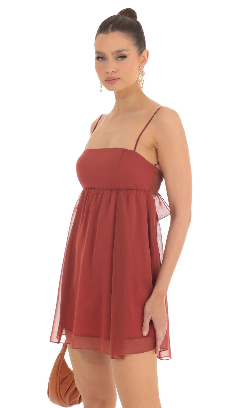 Picture Baby Doll Dress in Dark Orange. Source: https://media-img.lucyinthesky.com/data/Feb23/850xAUTO/70c9350a-5b41-4040-a2fd-96e1a40a503d.jpg