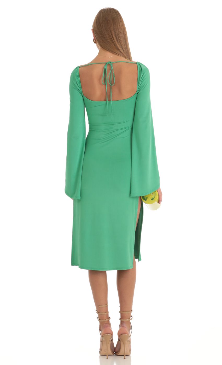 Picture Glitter Flare Sleeve Midi Dress in Green. Source: https://media-img.lucyinthesky.com/data/Feb23/850xAUTO/717ecf47-01d3-4b4d-b8db-280c0f730ee9.jpg
