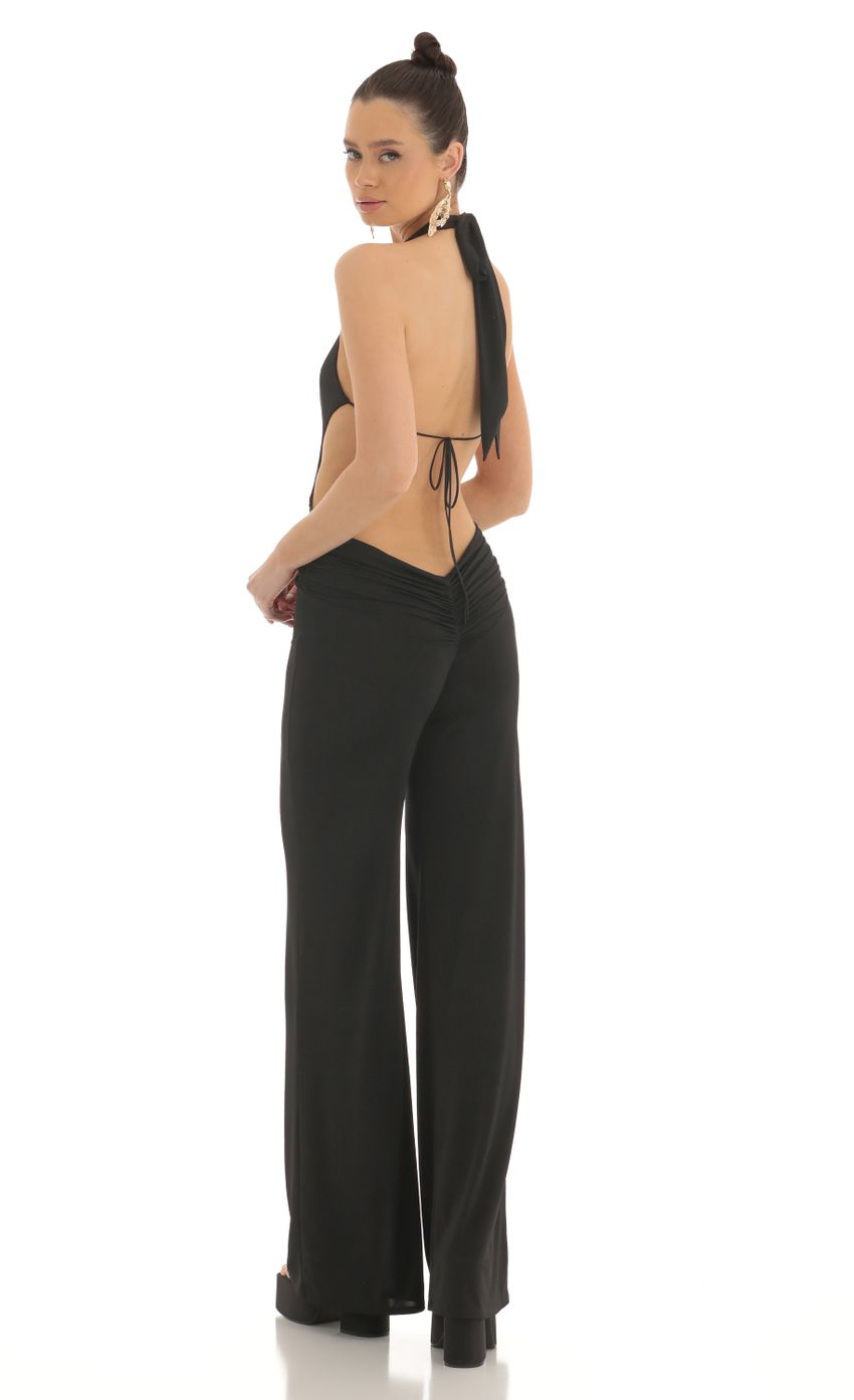 Picture Plunge Halter Jumpsuit in Black. Source: https://media-img.lucyinthesky.com/data/Feb23/850xAUTO/748e3657-492f-447c-bc1e-25a4f8d8923e.jpg