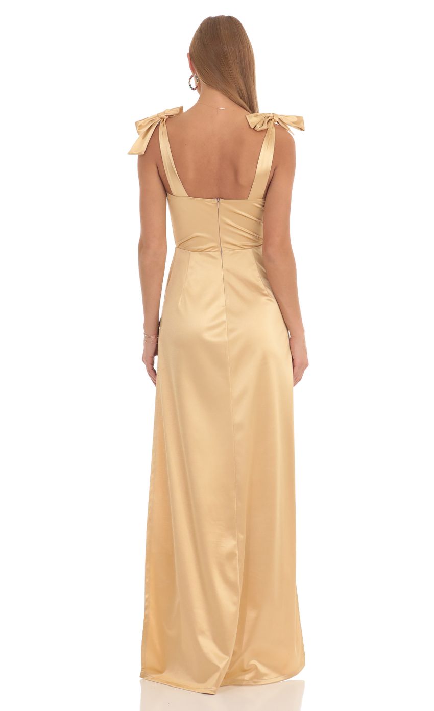 Picture Satin Slit Maxi Dress in Gold. Source: https://media-img.lucyinthesky.com/data/Feb23/850xAUTO/7df2b12e-c36d-4071-b516-874ba86464f9.jpg