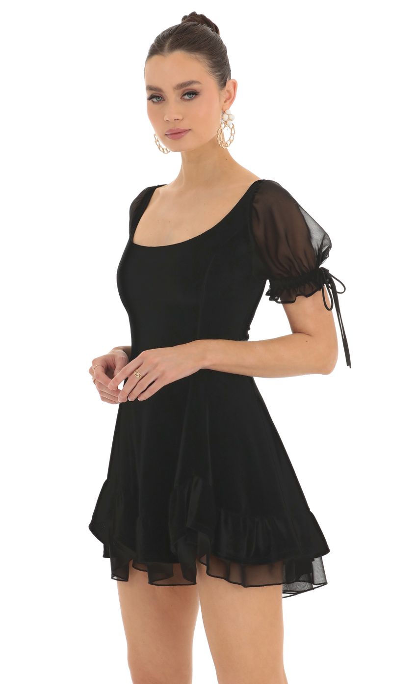 Picture Velvet Short Sleeve Fit and Flare Dress in Black. Source: https://media-img.lucyinthesky.com/data/Feb23/850xAUTO/8f822dd0-73b6-4f6a-860d-f2180762f0b6.jpg
