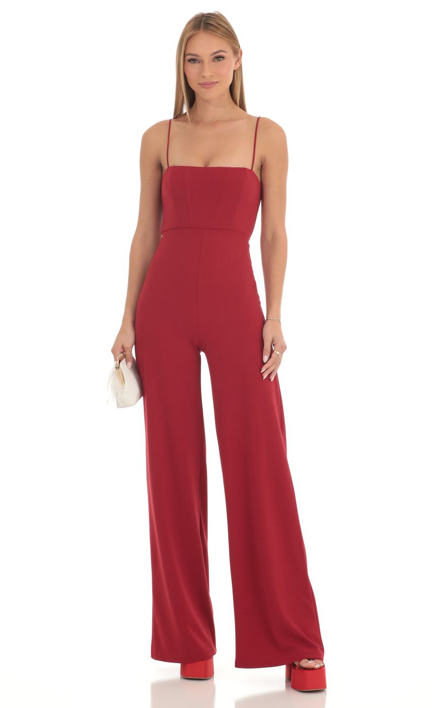 Picture Wide Leg Corset Jumpsuit in Red. Source: https://media-img.lucyinthesky.com/data/Feb23/850xAUTO/90344cfc-3c32-4751-9fa4-32ce3e18093b.jpg