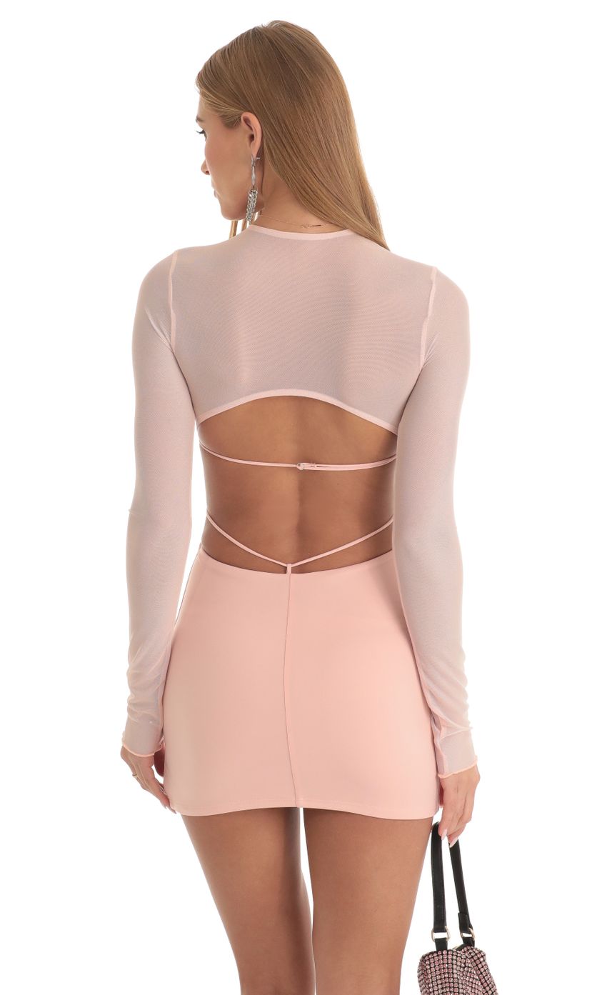 Picture Long Sleeve Open Back Dress in Peach. Source: https://media-img.lucyinthesky.com/data/Feb23/850xAUTO/99ec472f-38dc-4cb8-8255-91562ebed4aa.jpg