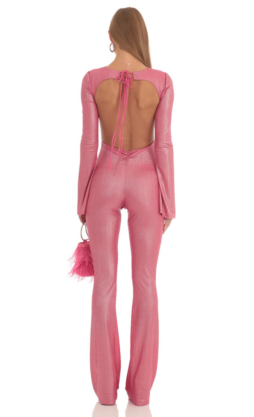 Picture Kim Shimmer Open Back Jumpsuit in Hot Pink. Source: https://media-img.lucyinthesky.com/data/Feb23/850xAUTO/a4609071-1db7-4803-bada-d219932494a0.jpg