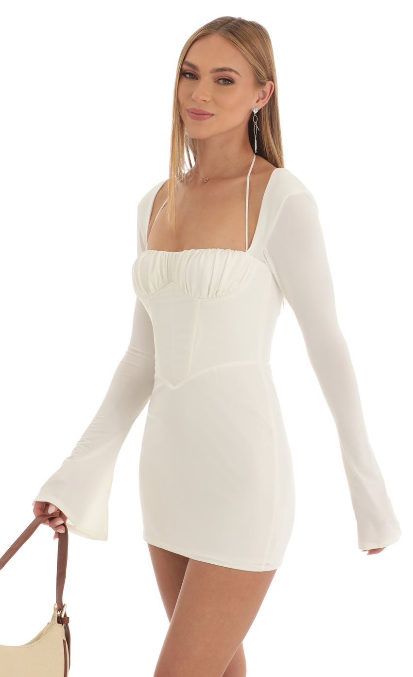 Picture Corset Long Sleeve Dress in White. Source: https://media-img.lucyinthesky.com/data/Feb23/850xAUTO/ae968157-cbdb-48fa-a822-f3c4de7fe68f.jpg