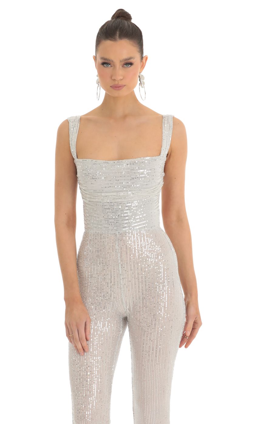 Picture Sequin Wide Leg Slit Jumpsuit in Silver. Source: https://media-img.lucyinthesky.com/data/Feb23/850xAUTO/b5bd5aab-d0cd-48eb-9f37-5c7958403500.jpg