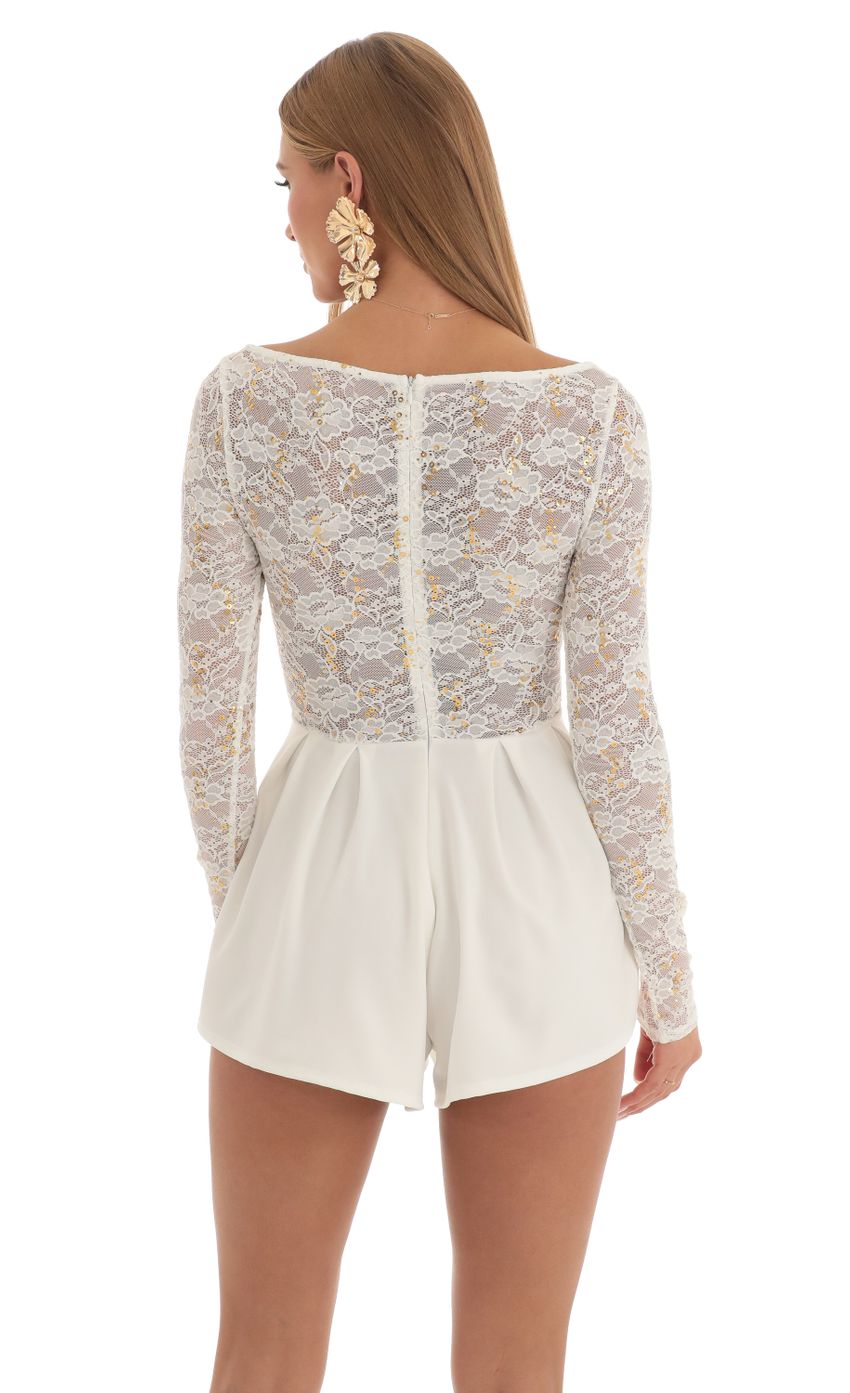 Picture Sequin Lace Romper in White. Source: https://media-img.lucyinthesky.com/data/Feb23/850xAUTO/cdb8224e-b347-492a-9439-30ccbc03dece.jpg