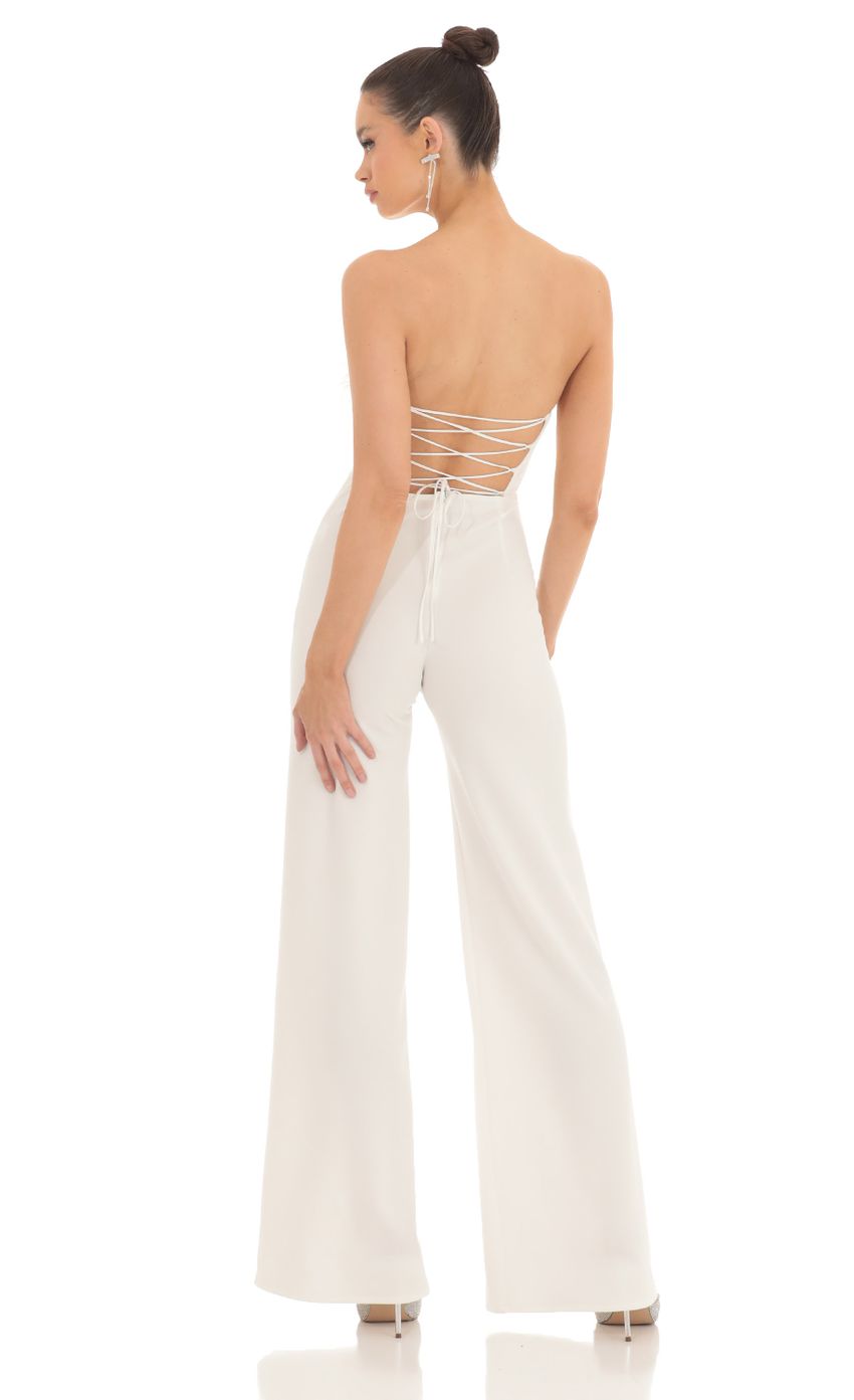 Picture Femi Feather Strapless Corset Jumpsuit in White. Source: https://media-img.lucyinthesky.com/data/Feb23/850xAUTO/d3cc072a-8c69-4479-b3d9-4ddb10d4d389.jpg