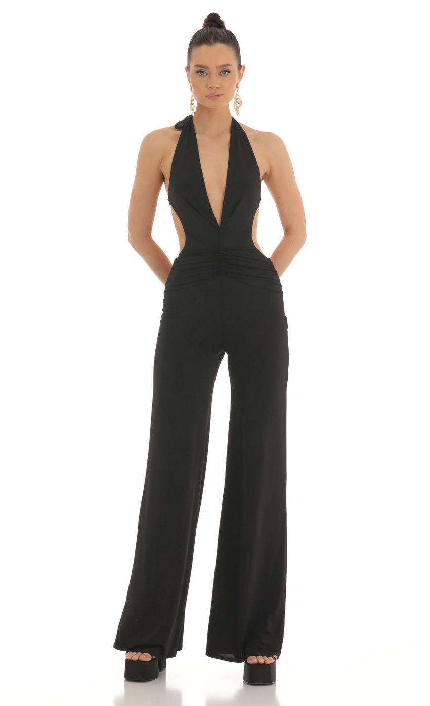 Picture Plunge Halter Jumpsuit in Black. Source: https://media-img.lucyinthesky.com/data/Feb23/850xAUTO/ddf20ae3-6f86-4aa2-8d9f-87e01aa157af.jpg