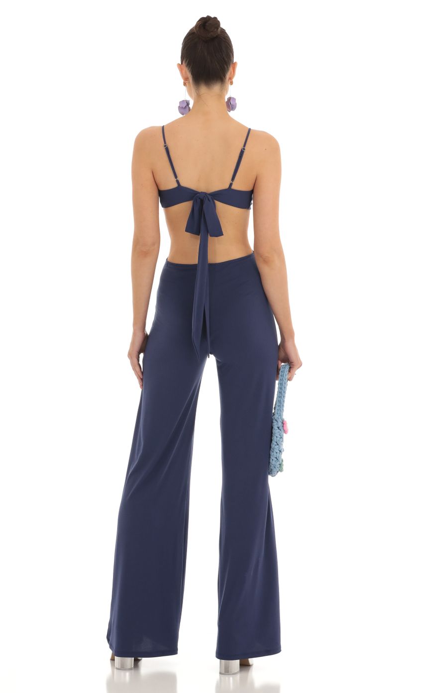 Picture Cutout O Ring Jumpsuit in Navy. Source: https://media-img.lucyinthesky.com/data/Feb23/850xAUTO/eb946dc1-b84b-4b7f-8015-ce23e2166774.jpg