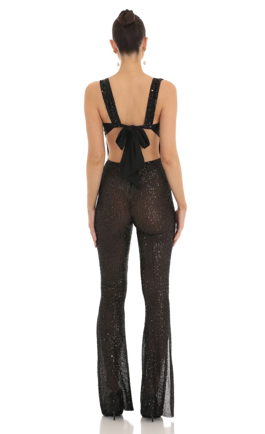 Picture Sequin Back Bow Tie Slit Jumpsuit in Black. Source: https://media-img.lucyinthesky.com/data/Feb23/850xAUTO/eee666dd-2271-4cda-9b3a-623fdd3b6ae2.jpg