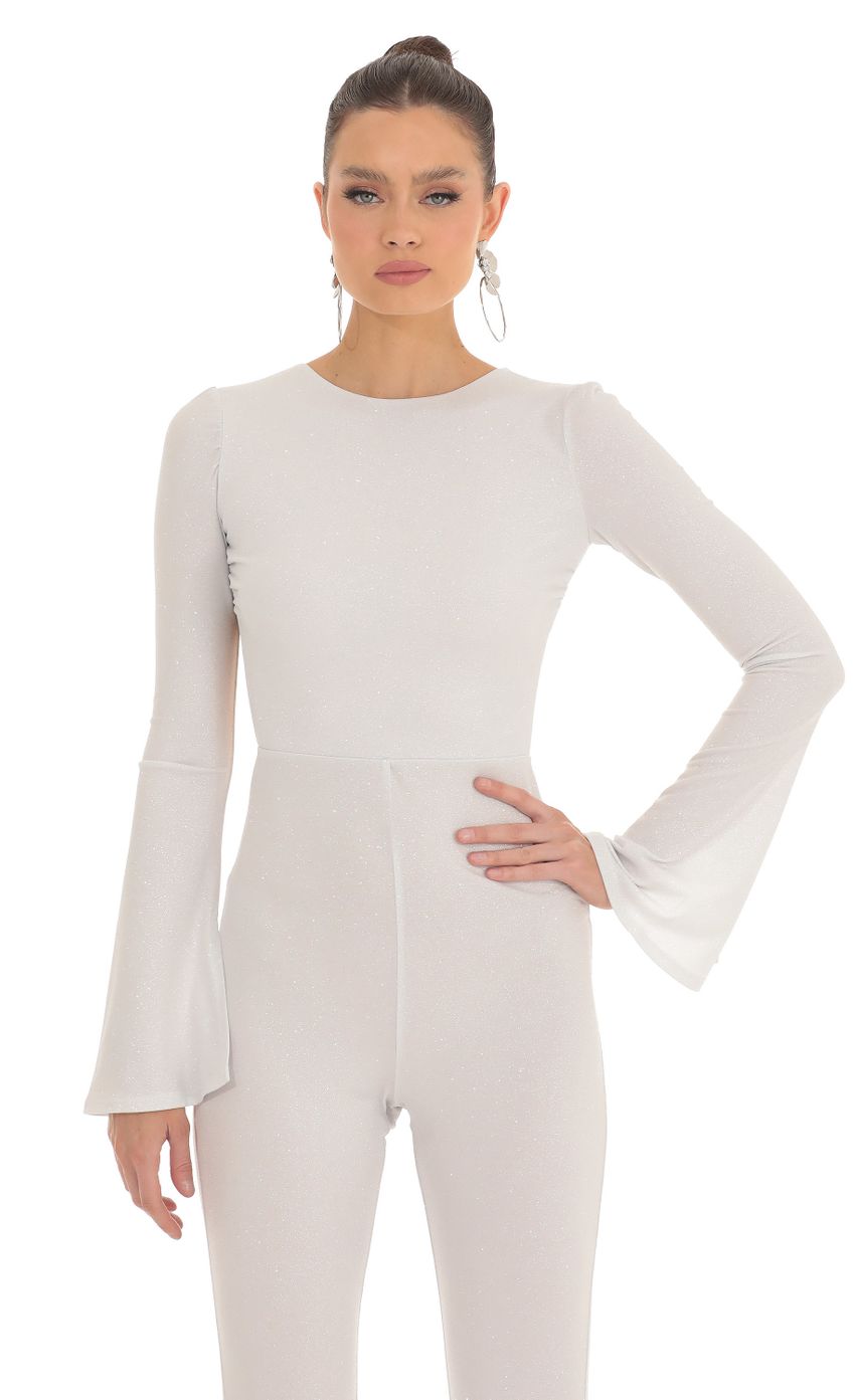 Picture Silver Shimmer Open Back Jumpsuit in White. Source: https://media-img.lucyinthesky.com/data/Feb23/850xAUTO/f9cab6d8-668d-4468-87dd-80fd9aeb4da1.jpg