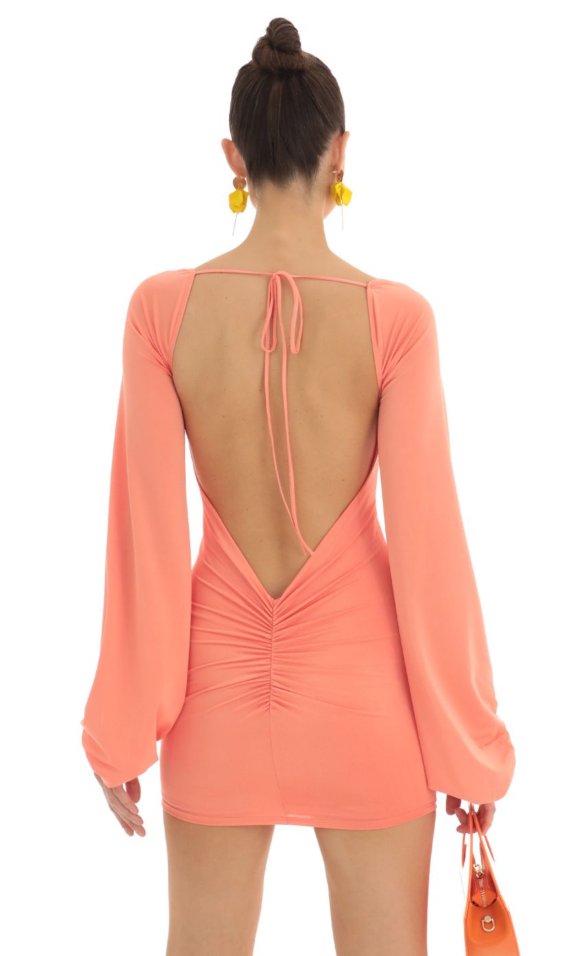 Picture Kirsten Ruched Open Back Dress in Peach. Source: https://media-img.lucyinthesky.com/data/Feb23/850xAUTO/ff2039f1-e6ad-4bbf-82ca-5722713bd520.jpg