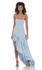 Picture Strapless Ruffle Asymmetrical Maxi Dress in Blue. Source: https://media-img.lucyinthesky.com/data/Feb24/150xAUTO/355419df-ada1-46fa-9a68-73fbd001be3c.jpg