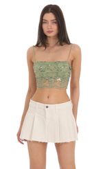 Picture Sequin Lace Crop Top in White. Source: https://media-img.lucyinthesky.com/data/Feb24/150xAUTO/52b374e8-4504-4781-8c80-120af86a49a1.jpg