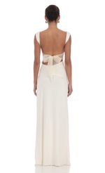 Picture Open Back Bow Maxi Dress in White. Source: https://media-img.lucyinthesky.com/data/Feb24/150xAUTO/59be2ca0-5555-4114-8cdc-8812ad06a571.jpg