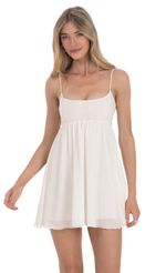 Picture Embroidered Babydoll Dress in White. Source: https://media-img.lucyinthesky.com/data/Feb24/150xAUTO/6127d868-4b54-4696-b29d-ccdbdf6e2bc7.jpg