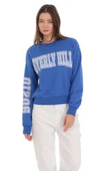 Picture Beverly Hills 90210 Jumper in Blue. Source: https://media-img.lucyinthesky.com/data/Feb24/150xAUTO/76cab0d9-7dfe-47d7-9391-7472a34a0ec7.jpg