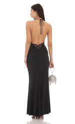 Picture Halter Open Back Butterfly Maxi Dress in Black. Source: https://media-img.lucyinthesky.com/data/Feb24/150xAUTO/834af1d2-ee3b-4121-8818-446c165c2ee6.jpg