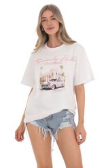 Picture Beverly Hills California Graphic T-Shirt in White. Source: https://media-img.lucyinthesky.com/data/Feb24/150xAUTO/98f8fcc0-b7f0-417f-bfb7-9e6e8ad5b699.jpg