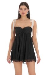 Picture Lace Shoulder Ties Babydoll Dress in Black. Source: https://media-img.lucyinthesky.com/data/Feb24/150xAUTO/a11b225d-a1d4-47b7-9cda-154d17727e53.jpg