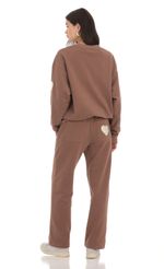Picture Heart Pocket Sweatpants in Brown. Source: https://media-img.lucyinthesky.com/data/Feb24/150xAUTO/f2f53f4e-0e0a-4c2b-9910-727c886889d1.jpg