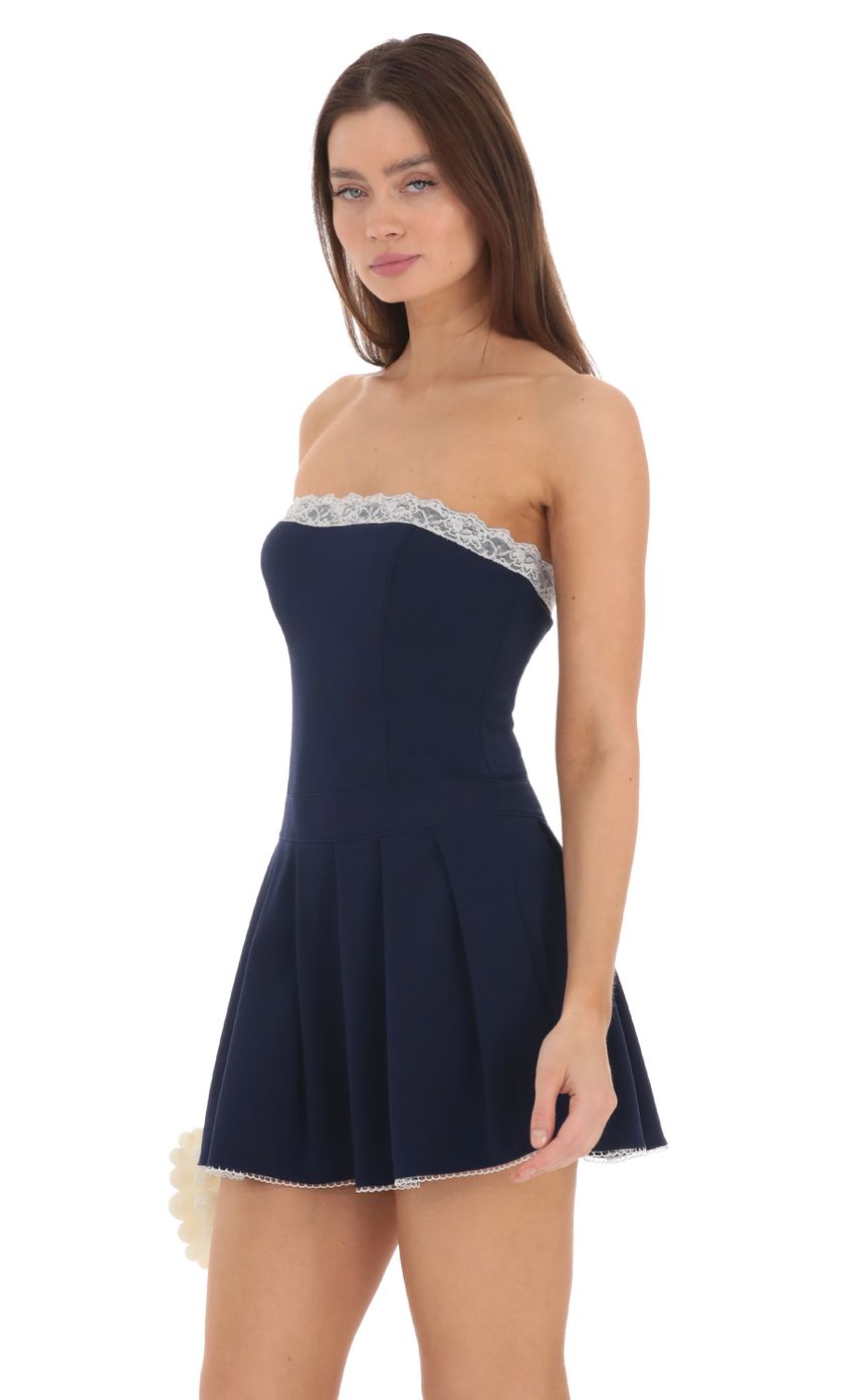 Picture Strapless Pleated Dress in Navy. Source: https://media-img.lucyinthesky.com/data/Feb24/850xAUTO/049299f7-d75c-4dc9-aad1-b58fe0f90947.jpg