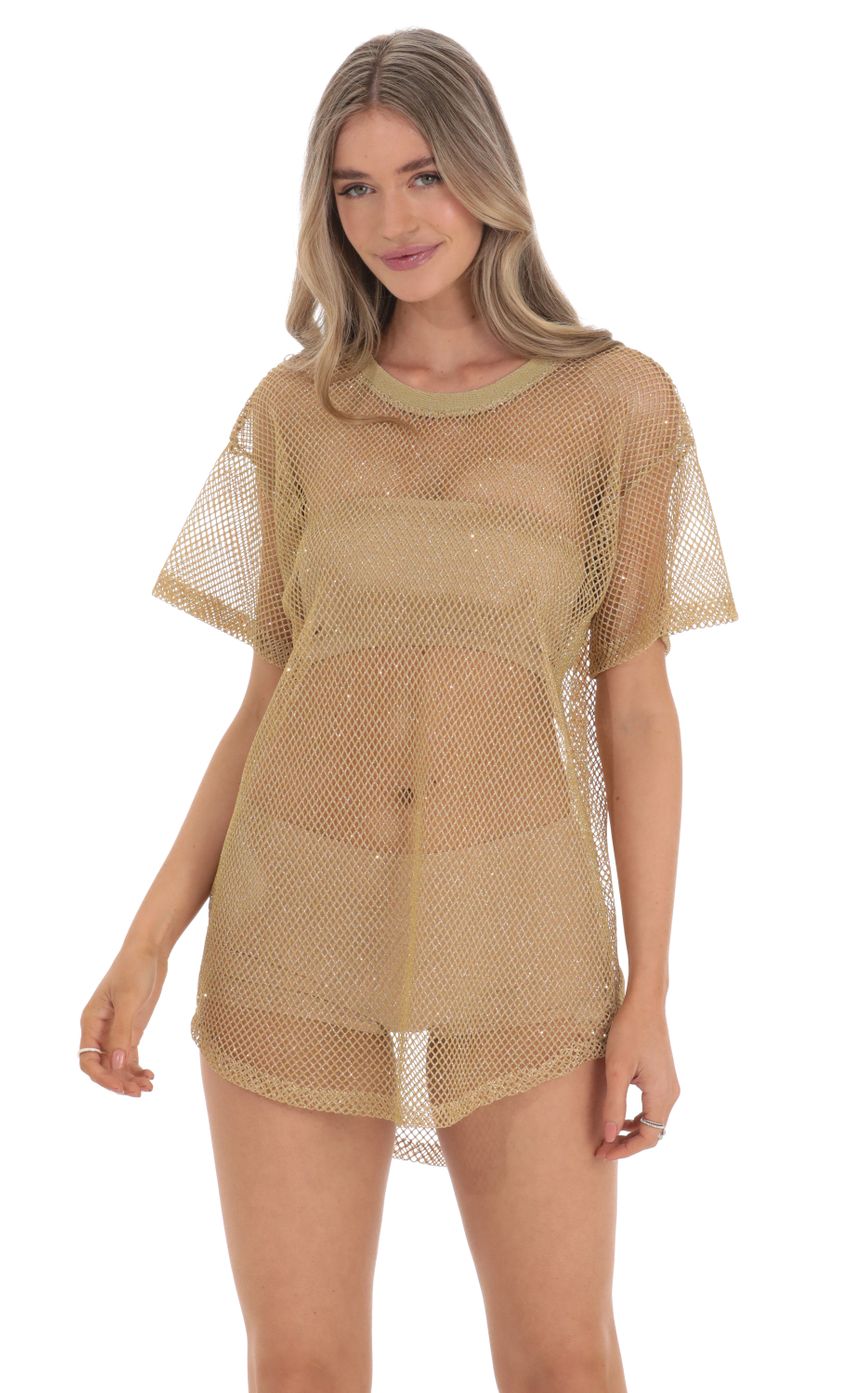 Picture Glitter Fishnet Shirt Dress in Gold. Source: https://media-img.lucyinthesky.com/data/Feb24/850xAUTO/06a4bf3e-a8d5-4f2e-892f-4003f0c04937.jpg