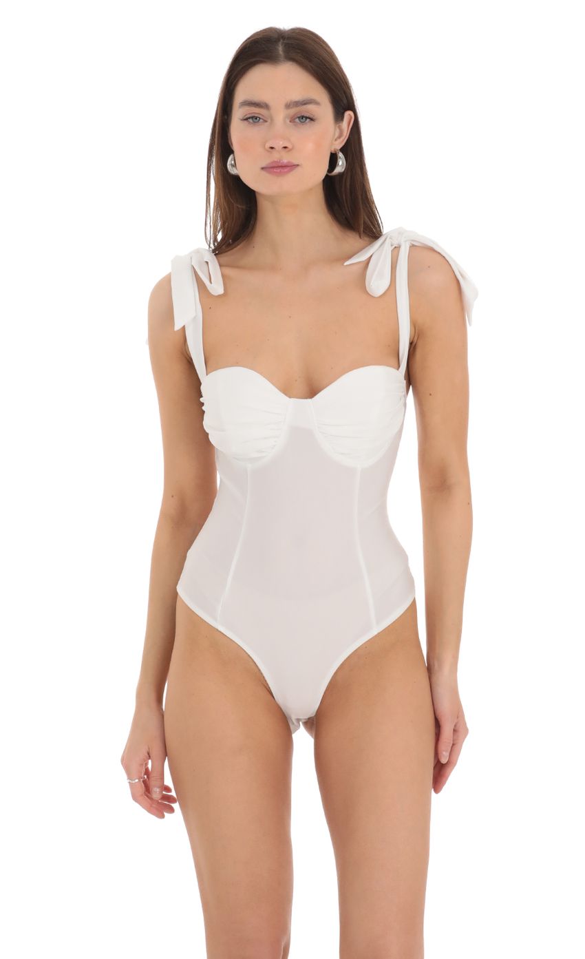 Picture Shoulder Ties Bodysuit in White. Source: https://media-img.lucyinthesky.com/data/Feb24/850xAUTO/0ae392bf-c1a0-4499-b4e1-fff3319046d7.jpg