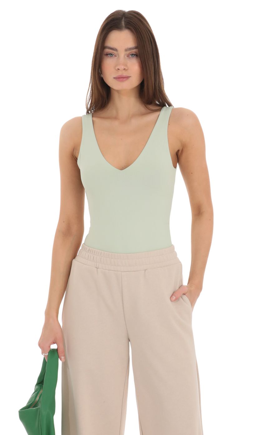 Picture V-Neck Bodysuit in Pistachio. Source: https://media-img.lucyinthesky.com/data/Feb24/850xAUTO/0fc2622d-89e2-4681-b785-60826a2c74f5.jpg