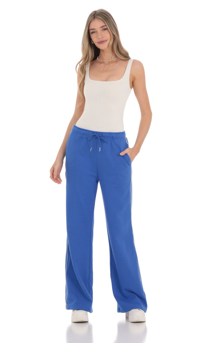 Picture Heart Pocket Sweatpants in Blue. Source: https://media-img.lucyinthesky.com/data/Feb24/850xAUTO/10cea524-34f4-416a-8378-6d630930e961.jpg