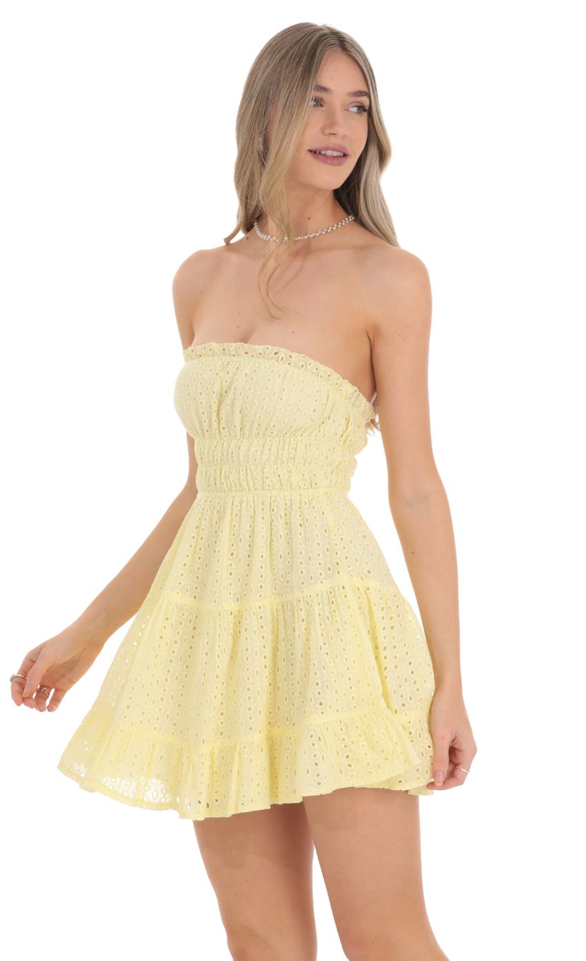Picture Strapless Eyelet Dress in Yellow. Source: https://media-img.lucyinthesky.com/data/Feb24/850xAUTO/1e357660-a9fb-4acc-bde2-d12b090dd6f3.jpg