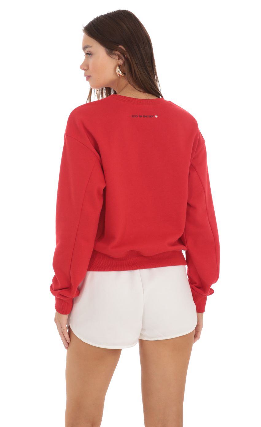 Picture Los Angeles Jumper in Red. Source: https://media-img.lucyinthesky.com/data/Feb24/850xAUTO/2270e2f8-11f8-4125-adaf-c3974936ae20.jpg