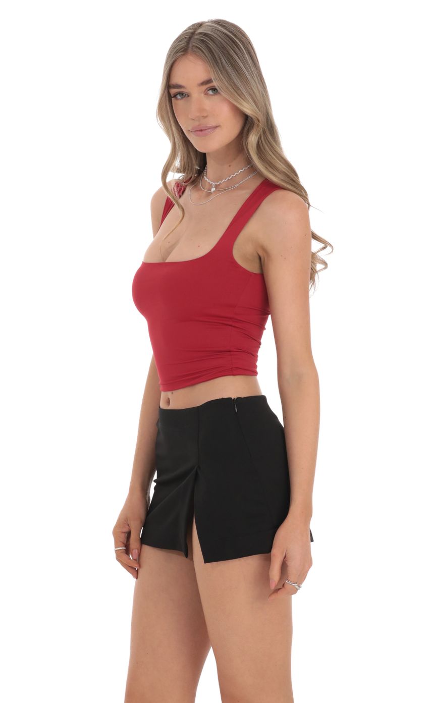Picture Scoop Neck Tank Top in Red. Source: https://media-img.lucyinthesky.com/data/Feb24/850xAUTO/2cecacde-5e4c-4950-8d5c-8a7f85e176a7.jpg