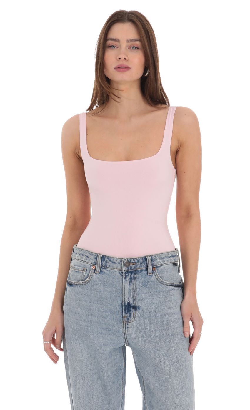 Picture Basic Tank Bodysuit in Pink. Source: https://media-img.lucyinthesky.com/data/Feb24/850xAUTO/2f41fef1-d82e-4f47-bf0f-5ead4b91133d.jpg