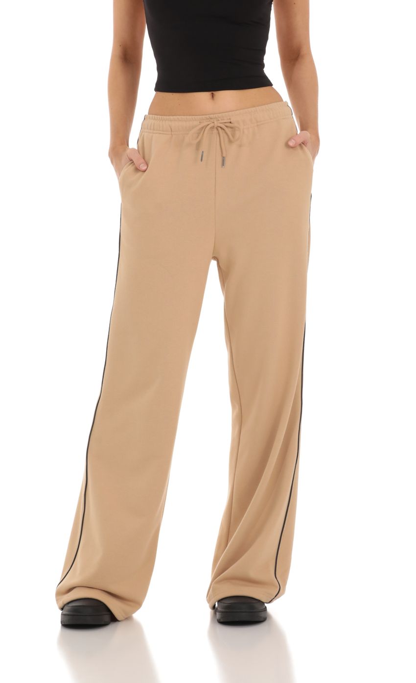 Picture Heart Pocket Sweatpants in Tan. Source: https://media-img.lucyinthesky.com/data/Feb24/850xAUTO/31c13f87-6bce-49d8-ad6f-6790760ea543.jpg