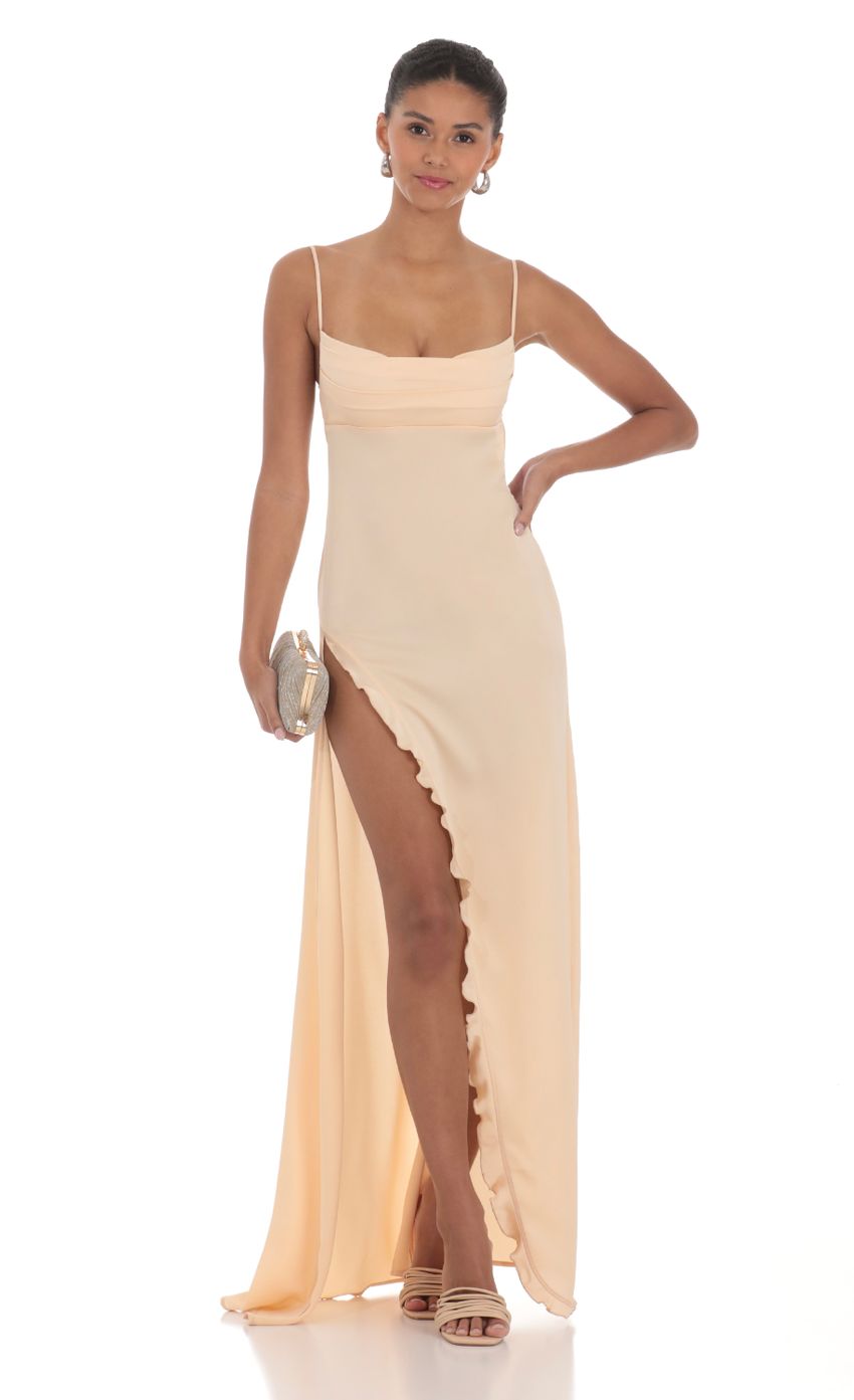 Picture Cowl Neck Satin Open Back Maxi Dress in Peach. Source: https://media-img.lucyinthesky.com/data/Feb24/850xAUTO/32b62496-12b1-43c0-8a27-9435cb2a6a3e.jpg