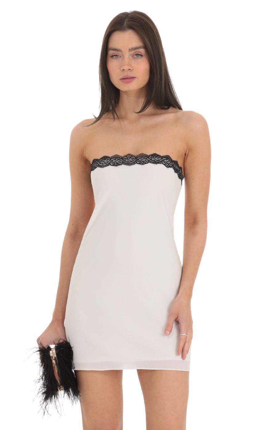 Picture Black Lace Strapless Dress in White. Source: https://media-img.lucyinthesky.com/data/Feb24/850xAUTO/37be16ca-a9d9-4d1b-84ae-a7a49f574363.jpg