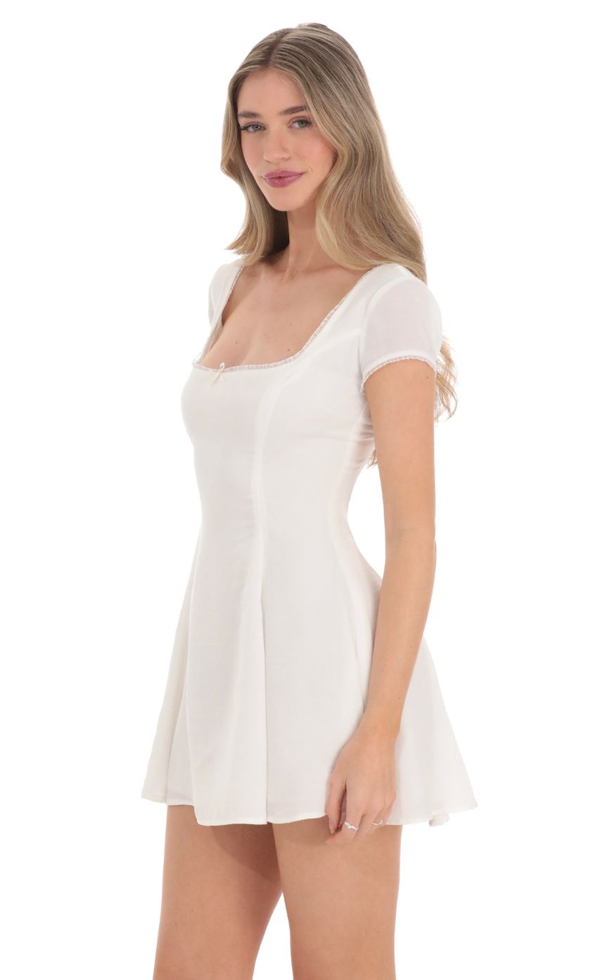 Picture Short Sleeve A-line Dress in White. Source: https://media-img.lucyinthesky.com/data/Feb24/850xAUTO/48579a84-4b88-4a21-9d8f-53bbfb40a697.jpg