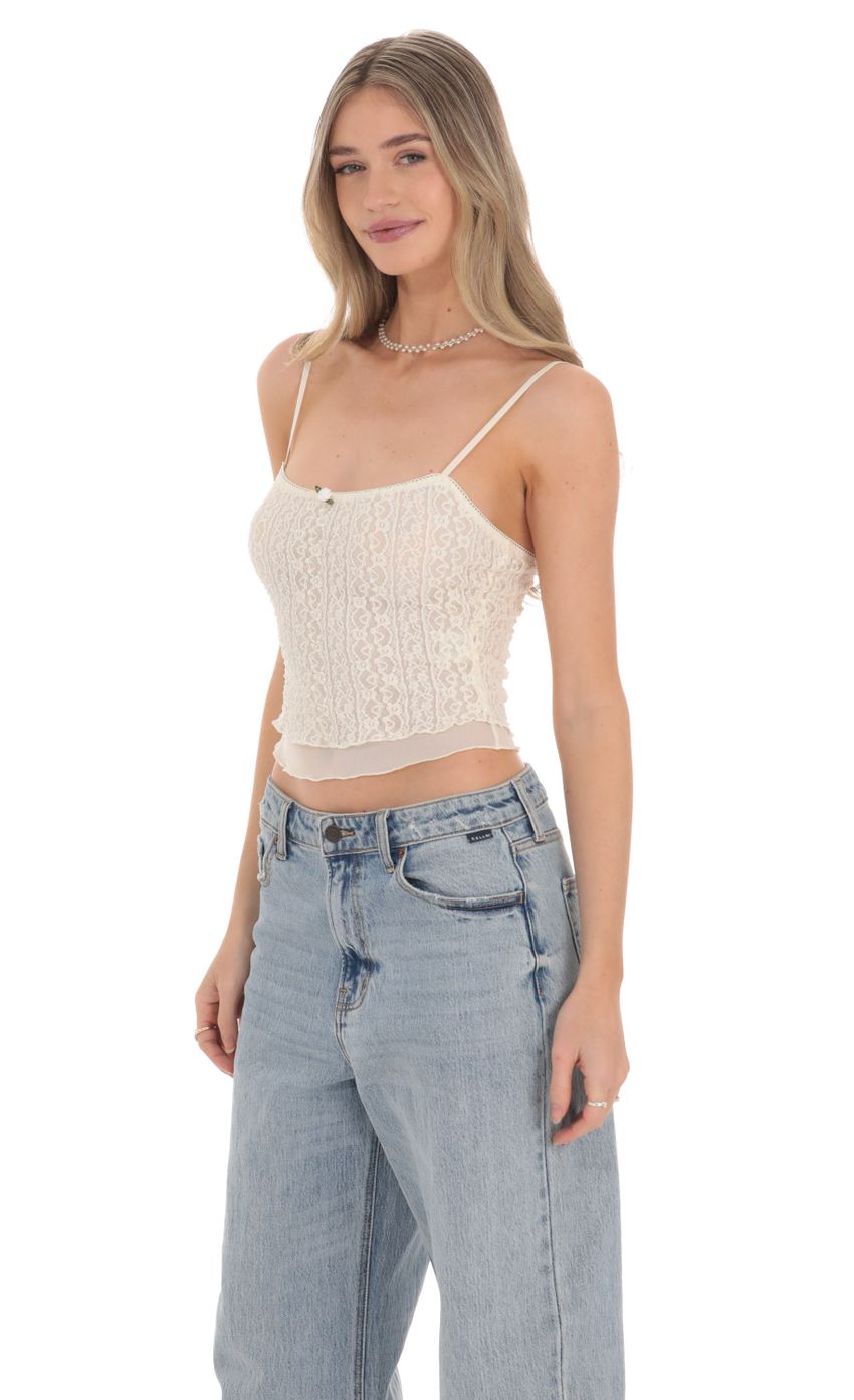 Picture Textured Mesh Top in Ivory. Source: https://media-img.lucyinthesky.com/data/Feb24/850xAUTO/4b24f7e6-089b-4004-880f-64b13efca675.jpg
