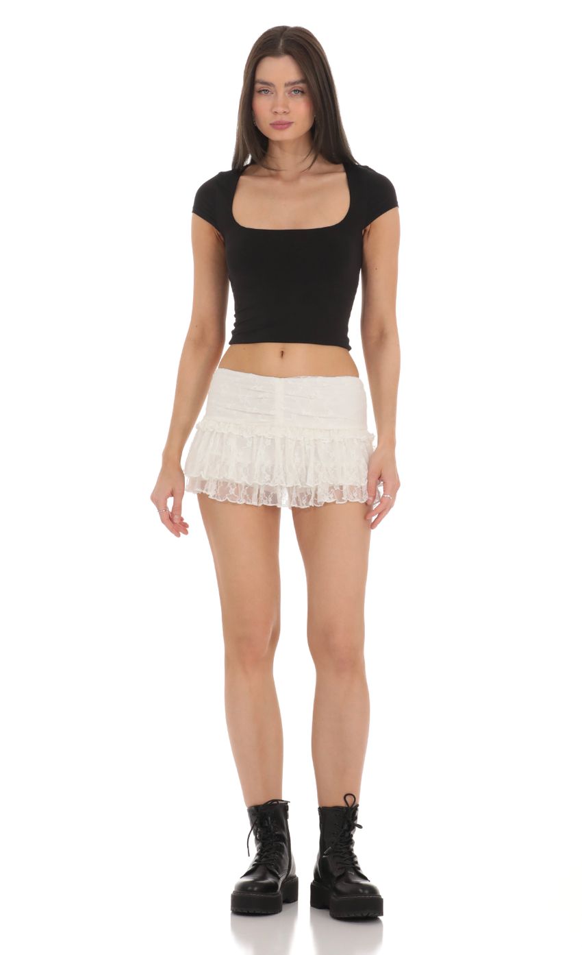 Picture Lace Ruffle Skort in White. Source: https://media-img.lucyinthesky.com/data/Feb24/850xAUTO/50d8472e-90f3-4572-bee8-5c39b8acf314.jpg