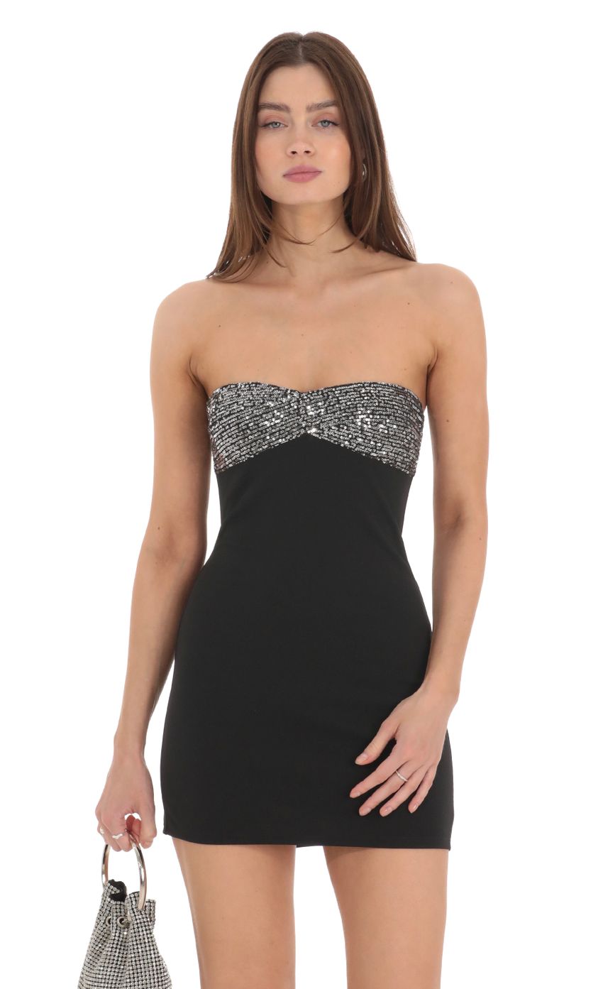 Picture Strapless Sequin Bust Bodycon Dress in Black. Source: https://media-img.lucyinthesky.com/data/Feb24/850xAUTO/5807a78e-f3ba-464b-82e0-2438729f1dc1.jpg