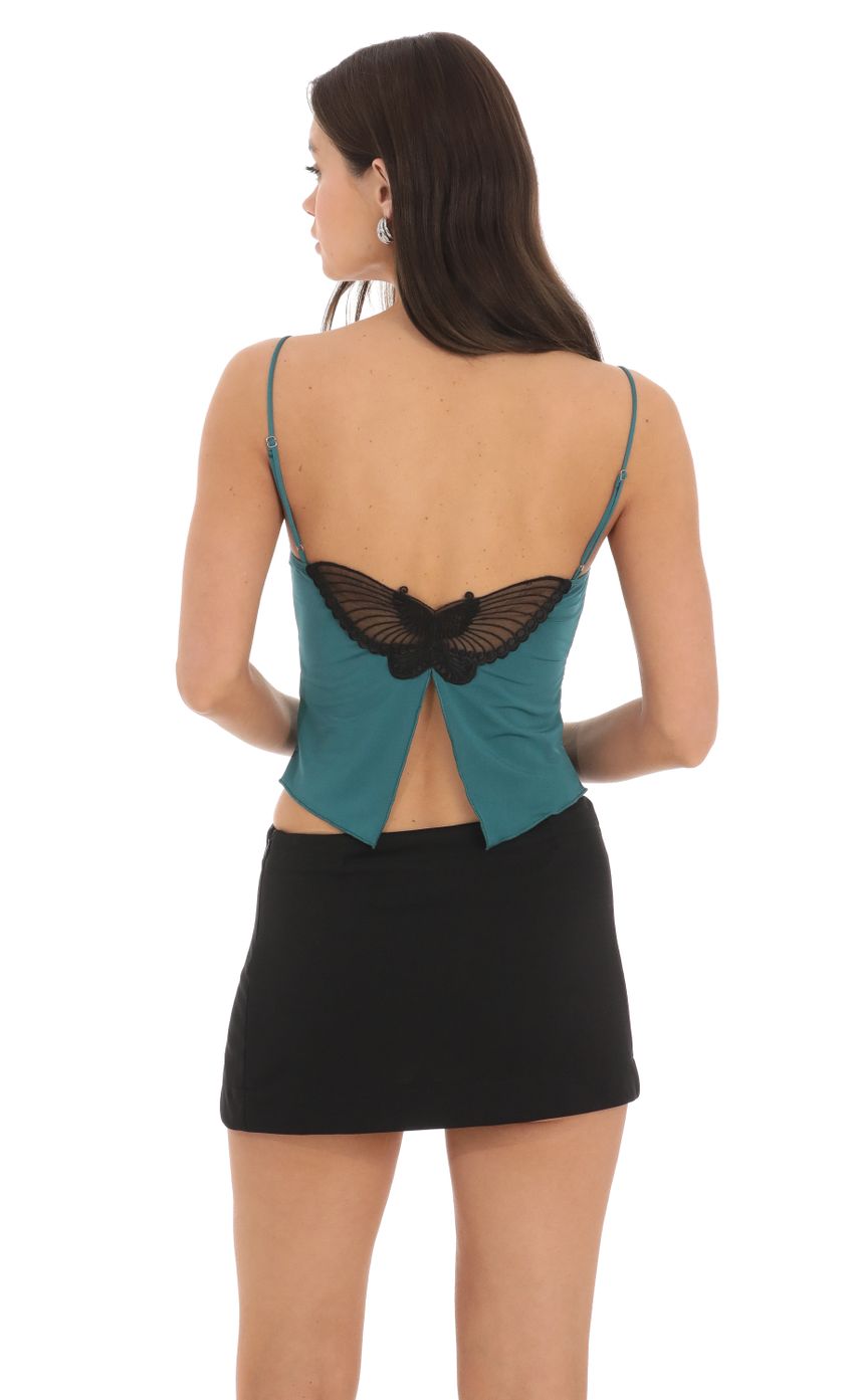 Picture Butterfly Top in Teal. Source: https://media-img.lucyinthesky.com/data/Feb24/850xAUTO/6392717d-4634-4792-8cbf-62a7db8a9d43.jpg