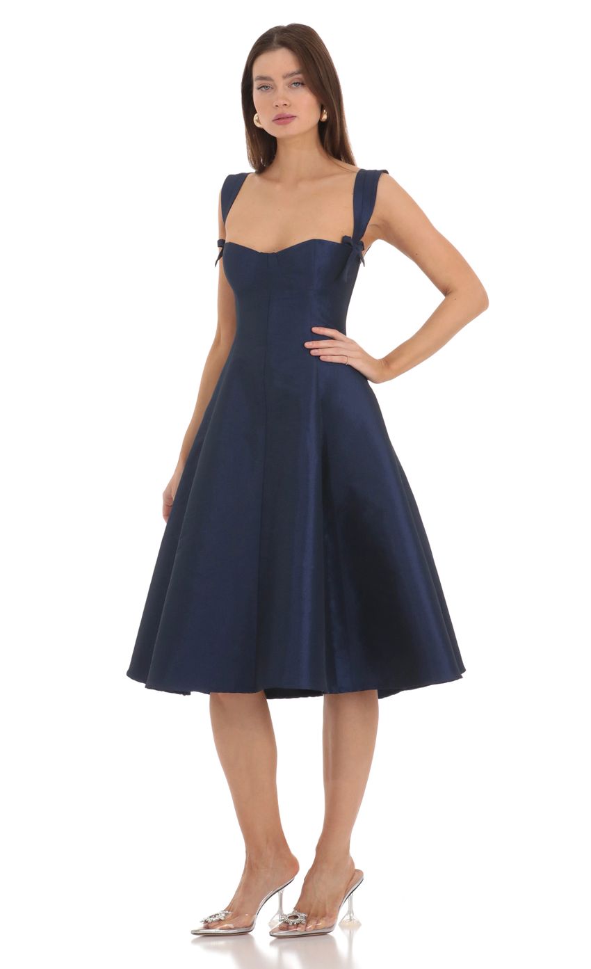Picture Bow Ties Fit and Flare Midi Dress in Navy. Source: https://media-img.lucyinthesky.com/data/Feb24/850xAUTO/6e07e858-aa9a-4abe-a0c0-10ffc580c956.jpg