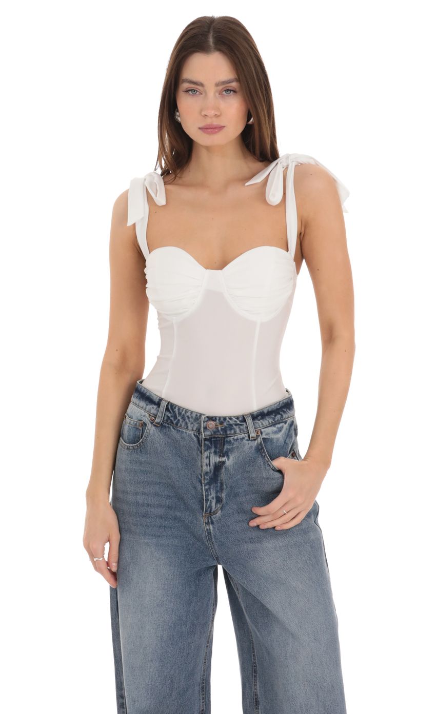 Picture Shoulder Ties Bodysuit in White. Source: https://media-img.lucyinthesky.com/data/Feb24/850xAUTO/8722236e-ec7e-4a93-abc3-7d860494ed2b.jpg