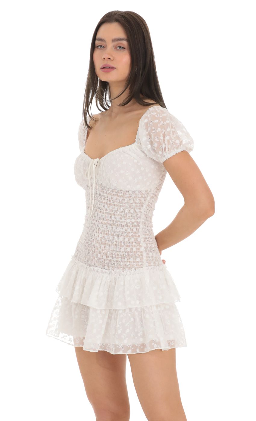 Picture Floral Smocked Ruffle Dress in White. Source: https://media-img.lucyinthesky.com/data/Feb24/850xAUTO/8989c09d-57c0-40d6-b712-0e6e36fddfc6.jpg