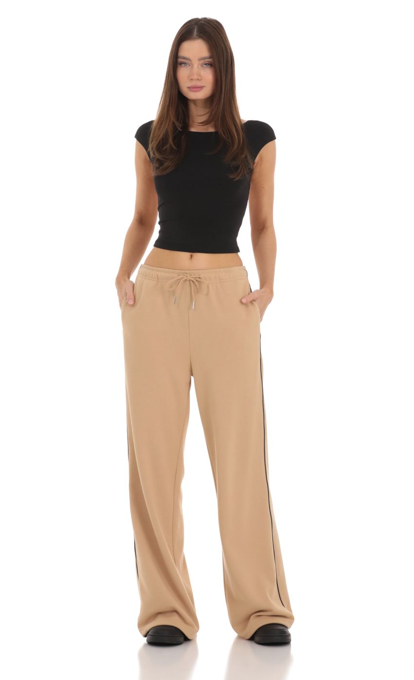 Picture Heart Pocket Sweatpants in Tan. Source: https://media-img.lucyinthesky.com/data/Feb24/850xAUTO/8d3448ff-360f-475c-a242-2681fe7a362f.jpg