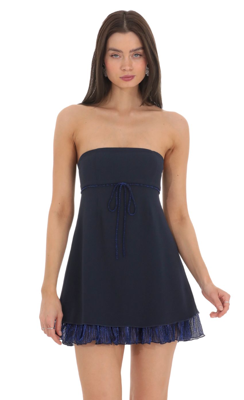 Picture Shimmer Ruffle Strapless Dress in Navy. Source: https://media-img.lucyinthesky.com/data/Feb24/850xAUTO/94868054-4251-4fe2-be02-1f6861ec41b8.jpg